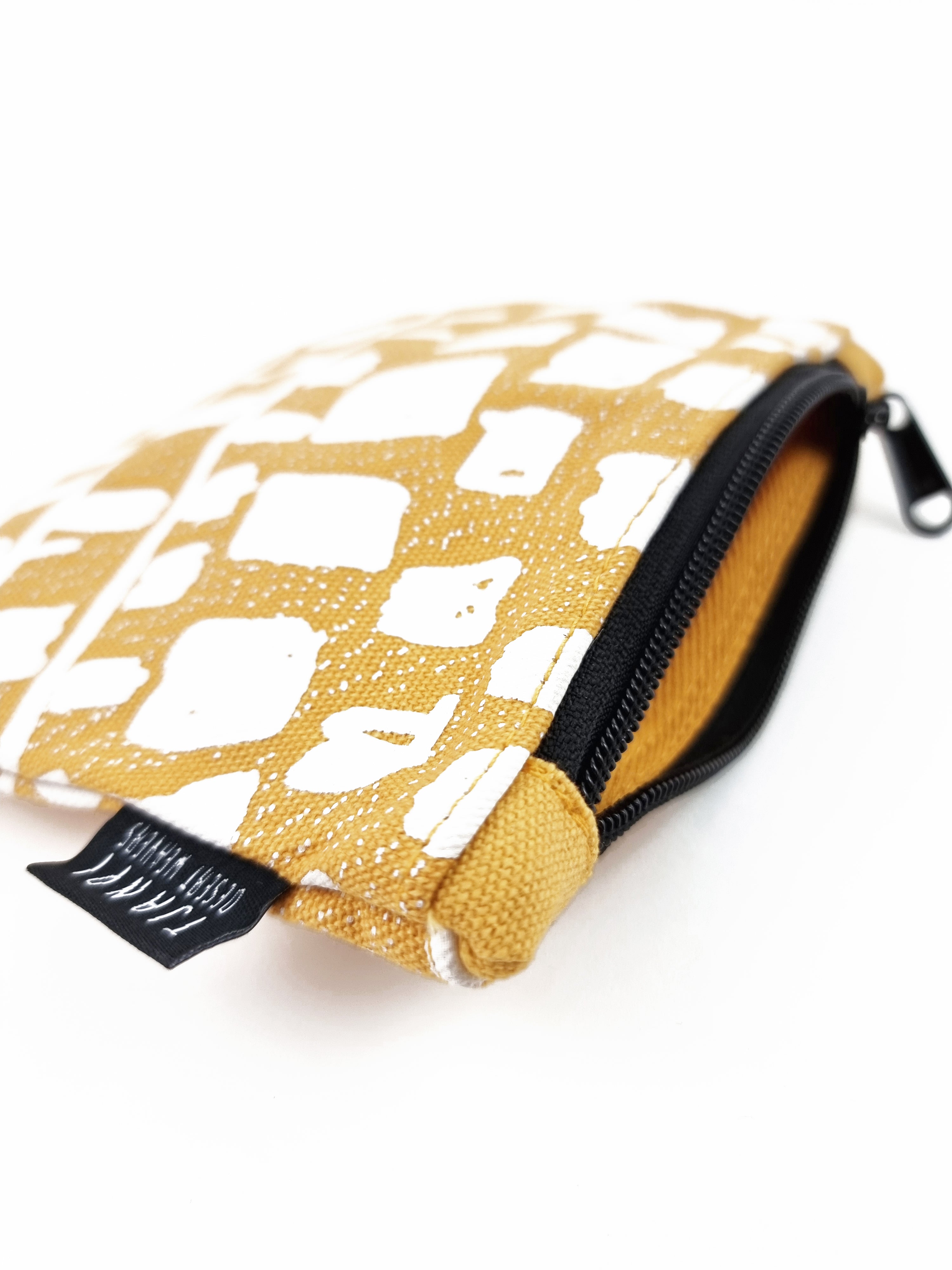 Zip Pouch by Margaret Smith in Yellow
